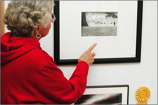 Viewing photographs in Old Town Hall, Marblehead.